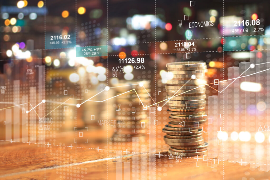 Abstract graphic of graphs and piles of coins to depict cloud computing cost